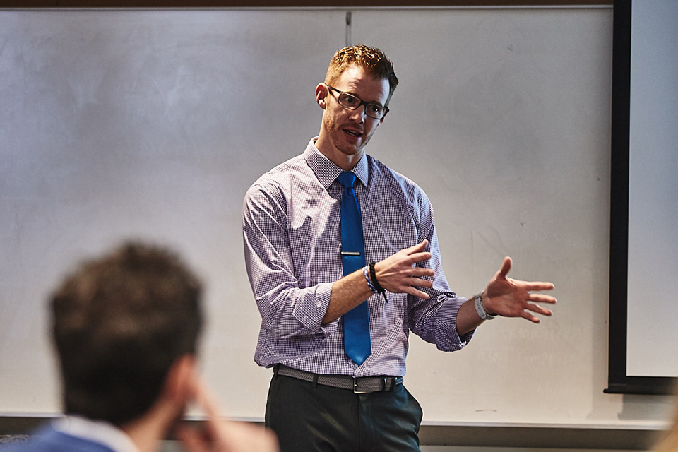 Brad Carlson, Ph.D. teaches a class in the Chaifetz School of Business at Saint Louis University.