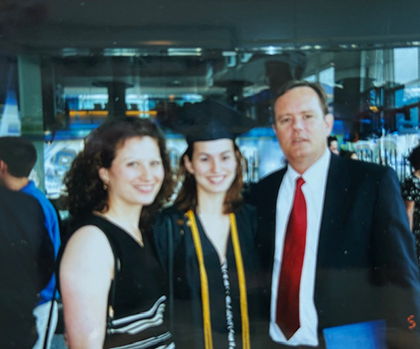 Beth O'Leary with her parents at her SLU graduation